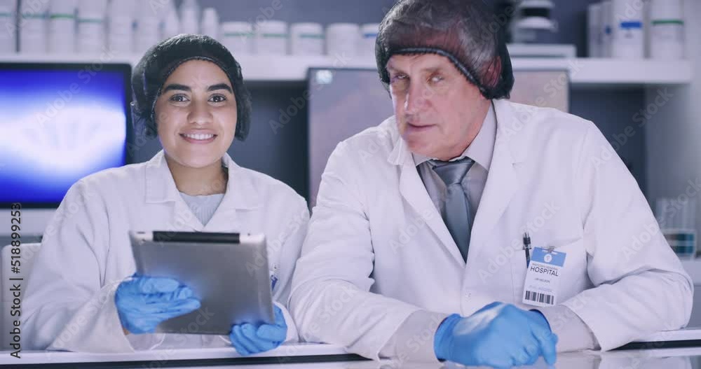 Aufkleber Team of scientists talking and reading research on a digital tablet while discussing and recording their findings in a medical laboratory. Portrait of researchers developing cures for virus in a lab