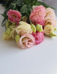 bouquet of pink flowers in the white table