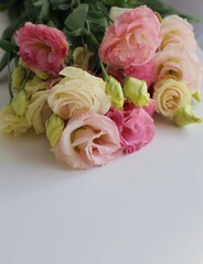 bouquet of pink flowers in the white table