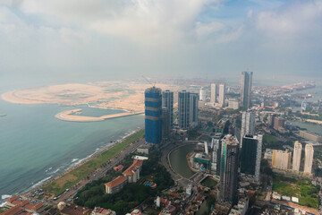 Aerial drone of residential areas of Colombo city and lotus tower. Sri Lanka.