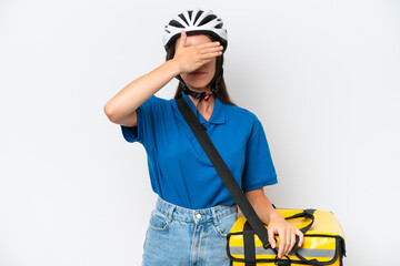 Young caucasian woman with thermal backpack isolated on white background covering eyes by hands. Do not want to see something