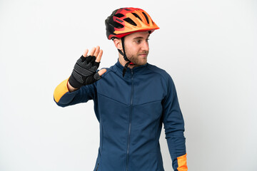 Young cyclist man isolated on white background making stop gesture and disappointed