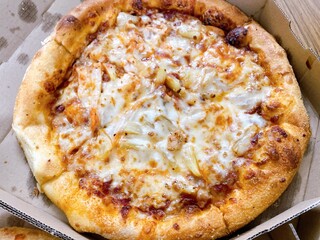pizza on a wooden board