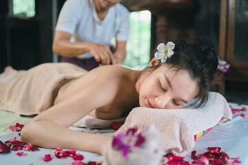 Massage and spa relaxing treatment of office syndrome using hot stone traditional thai massage...