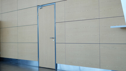 Light brown door and wall in building of airport station or business center