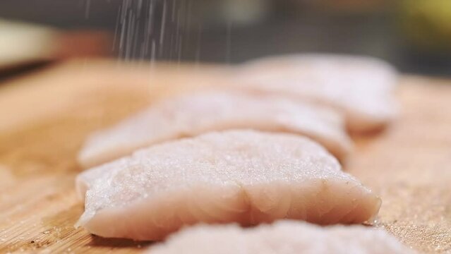 Salting of perch fillet, slow motion.
