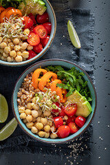 Diet salad with chickpeas, avocado, pepper and groats.