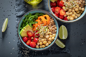 Fit salad with chickpeas, avocado, pepper and groats.