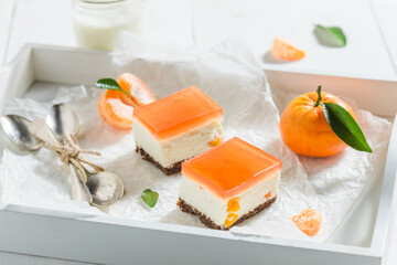 Cold chilled cheesecake made of mandarin and jelly