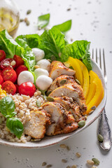 Delicious Caesar salad in the fit version with groats.