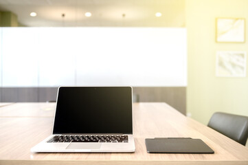 Modern laptop with creative pen tablet on the table