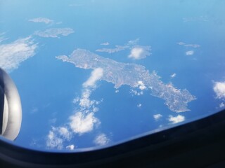 wyspa, krajobraz, lot, samolot, widok z lotu ptaka, Grecja, Santorini, chmury, wakacje, island, landscape, flight, plane, aerial view, greece, santorini, clouds, vacation © mchtv