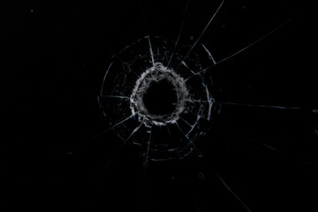 bullet hole on glass black background for overlay, transparent window