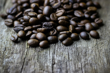 coffee beans on old wooden floor