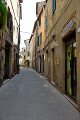 the historic center with its characteristic shops: butchers, cheeses and cured meats May Pitigliano Italy