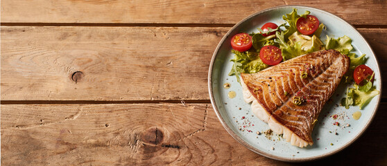 Fototapeta na wymiar Tasty fish on plate with vegetables