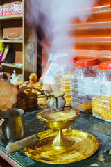 Making tea in a restaurant.