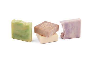 Handmade soap bars with organic ingredients on white background. Homemade beauty products with natural essential oils from plants and flowers. Body care, aromatherapy.