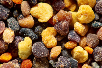 Pile of bee pollen on white, closeup
