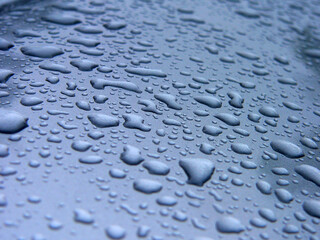 Drops of water on a blue background