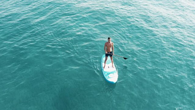 Surfing On A Paddle Sup Borad