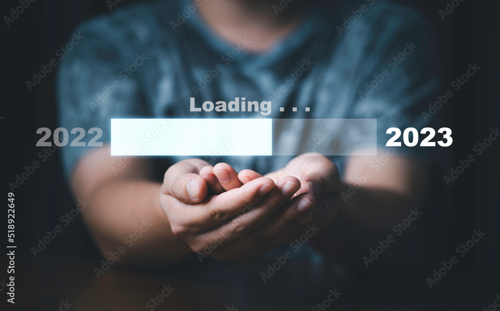 Poster businessman holding virtual loading bar for count down from 2022 to 2023 year of preparation merry c