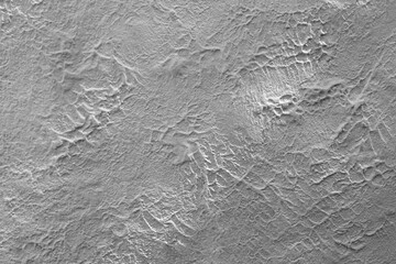 Gray abstract background. Plastered wall. Black and white image