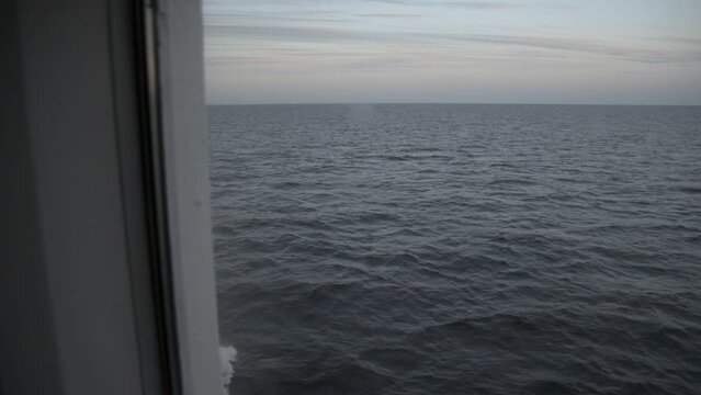 Ocean liner porthole view of the calm sea