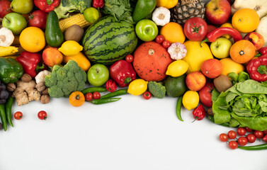Fitness concept. Healthy nutrition: fruits and vegetables. Equipment for fitness exercises: weighing machine and dumbells. White background.