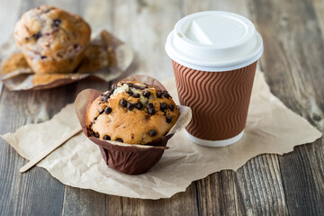Delicious fresh baked muffins served with coffee, ready for snacking.