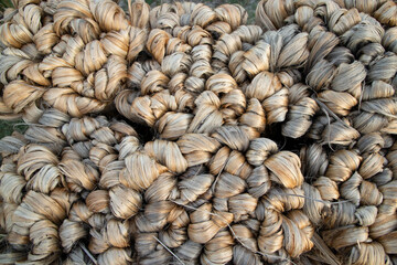 thick brown bundle of raw jute fiber Texture Background