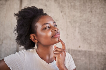 Closeup portrait of beautiful thoughtful young woman thinking guessing looking for idea against concrete wall