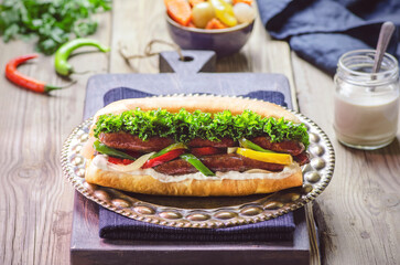 Arabic cuisine; Traditional Egyptian sausage sandwich or 