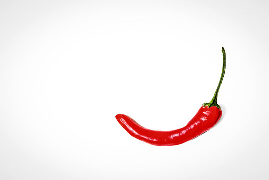 Red chili pepper isolated on white background 
