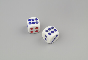 Dices on gay background close-up. Gambling concept.