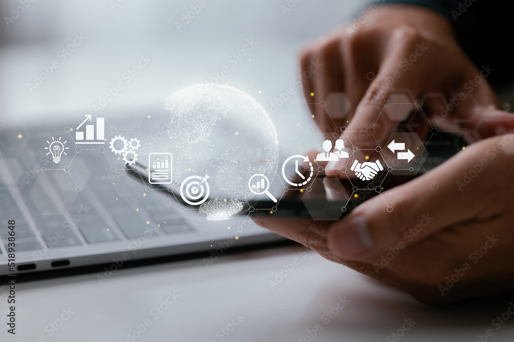 Aufkleber a businessperson with a smartphone. business worldwide internet connection application technology an