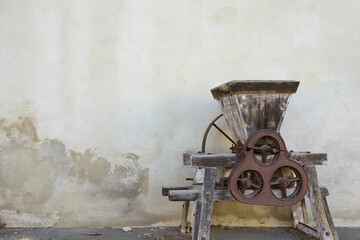Fototapeta na wymiar Historic fruit grinder, germany,copyspace