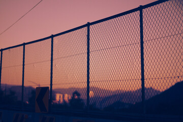 sunset and fence