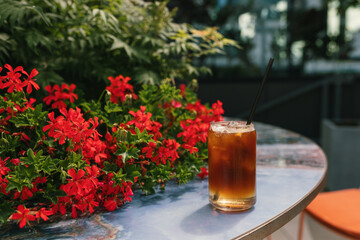 Cold drink with espresso and tonic in glass. Summer cold coffee.