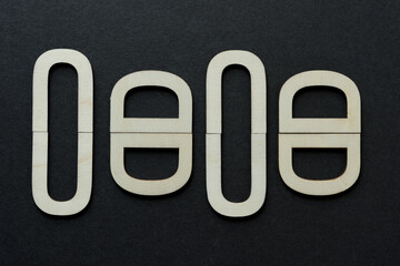 letters U and D arranged on paper