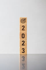 2023 block with dartboard sign. Business Goal, Target, Resolution, strategy, plan, Action motivation, mission, thinking, and New Year start concepts