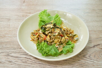 stir fried clams with roasted chili paste on plate