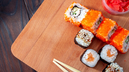 sushi on a wooden board