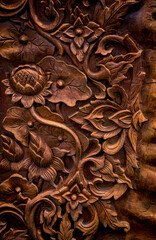 Details of a fine carving art on wooden door