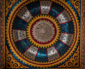 Fragment of an ancient mosaic at the asian temple