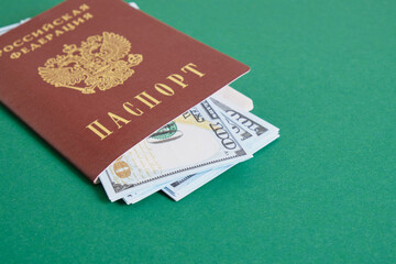 several 100 dollar bills in the passport of a citizen of Russia