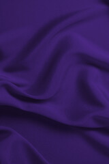 Rich and luxury red silk fabric texture background.