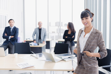 Portrait of businesswoman smiling working with diversity business group of people in office, Working woman and collaboration concept
