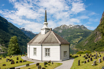 Fototapeta na wymiar Geiranger church (Geiranger kyrkje) Møre og Romsdal at Geirangerfjorden in Norway (Norwegen, Norge or Noreg)