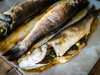 Roast perch on glass cooking pan